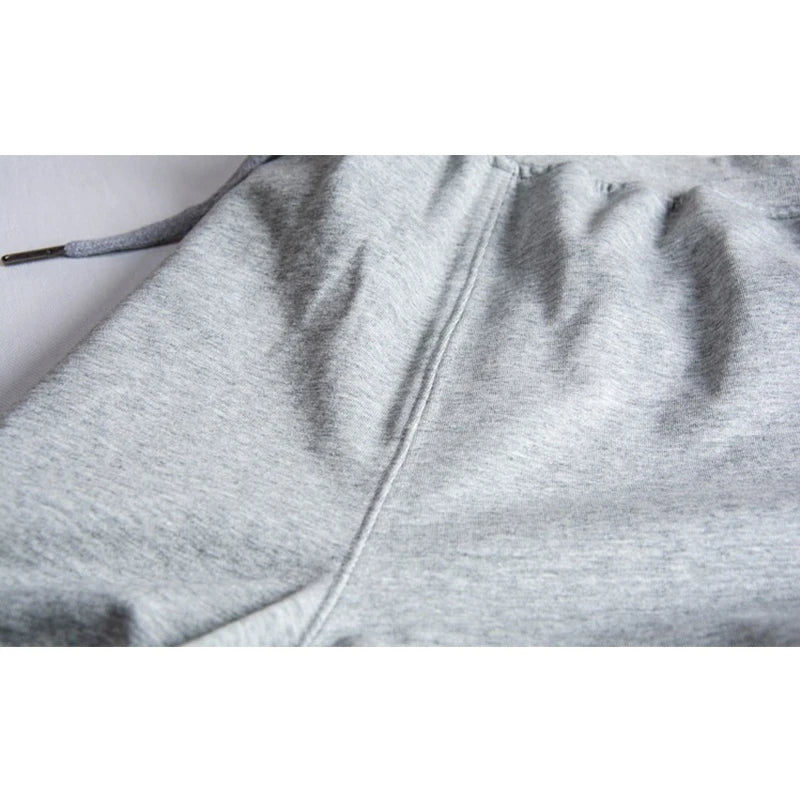 Pantalones cortos deportivos de hombre con cordón hasta la rodilla