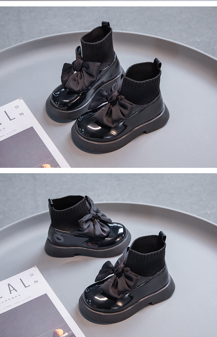 Zapatos escolares negros con lazo para niña