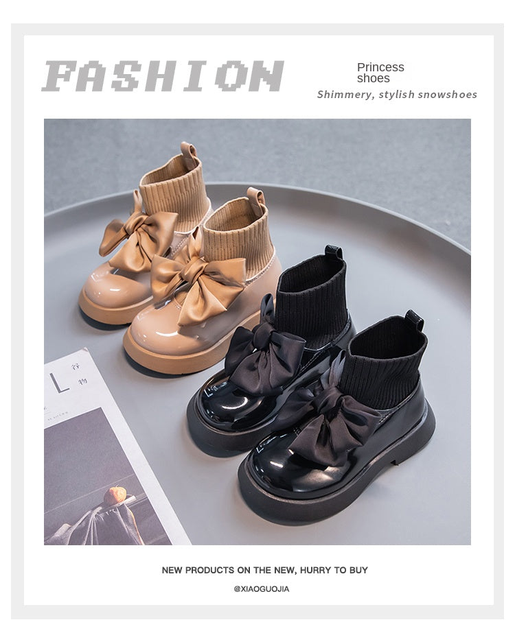 Zapatos escolares negros con lazo para niña