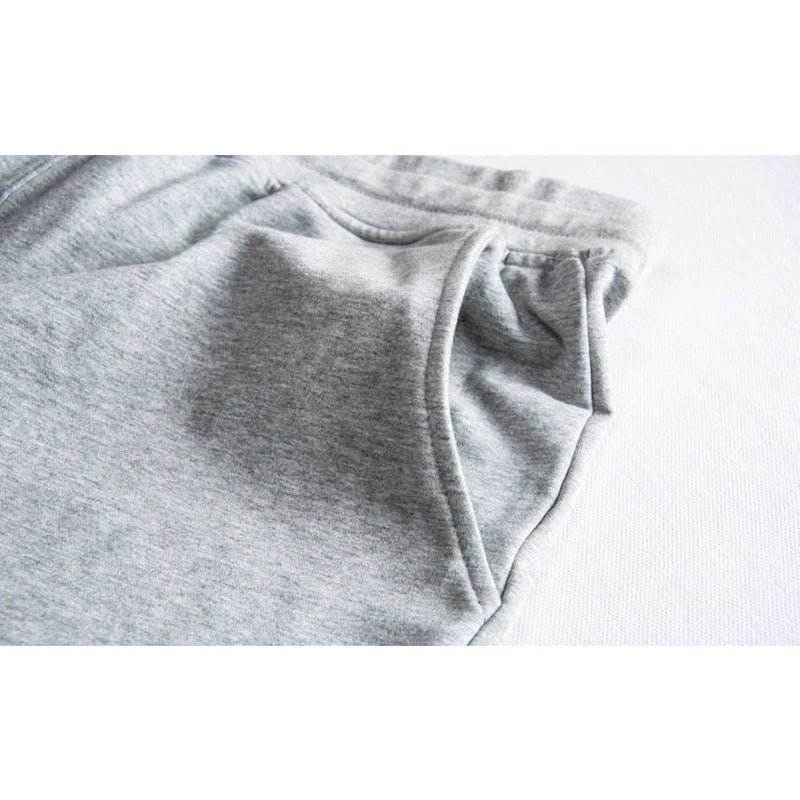 Pantalones cortos deportivos de hombre con cordón hasta la rodilla