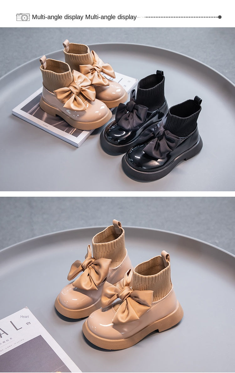 Zapatos escolares negros con lazo para niña