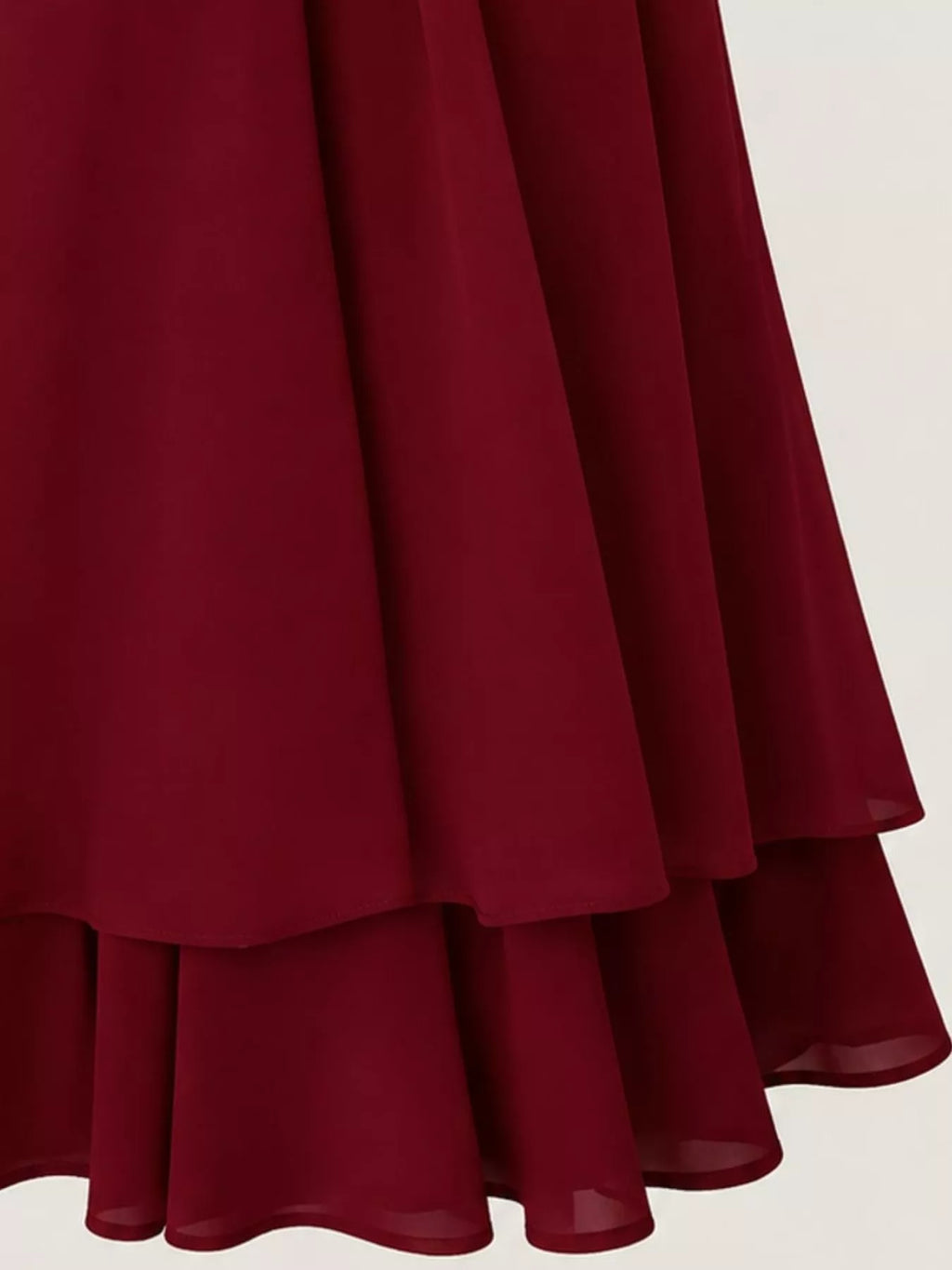 Halter neck chiffon mini dress by Trendsi, featuring a flowing lightweight fabric and stylish design perfect for summer occasions.