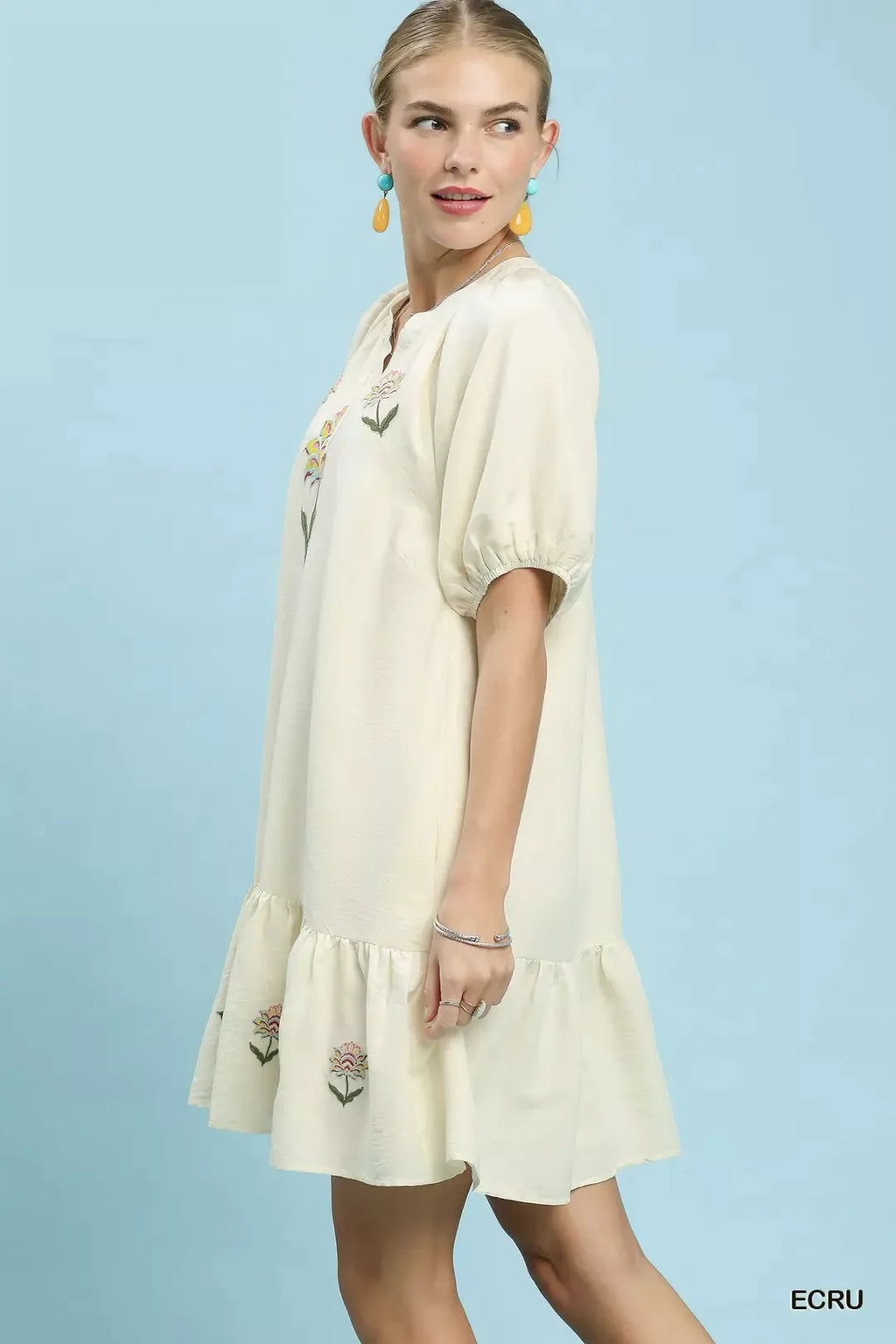 Umgee embroidered floral babydoll dress featuring delicate embroidery and a flowy silhouette, perfect for casual or summer wear.