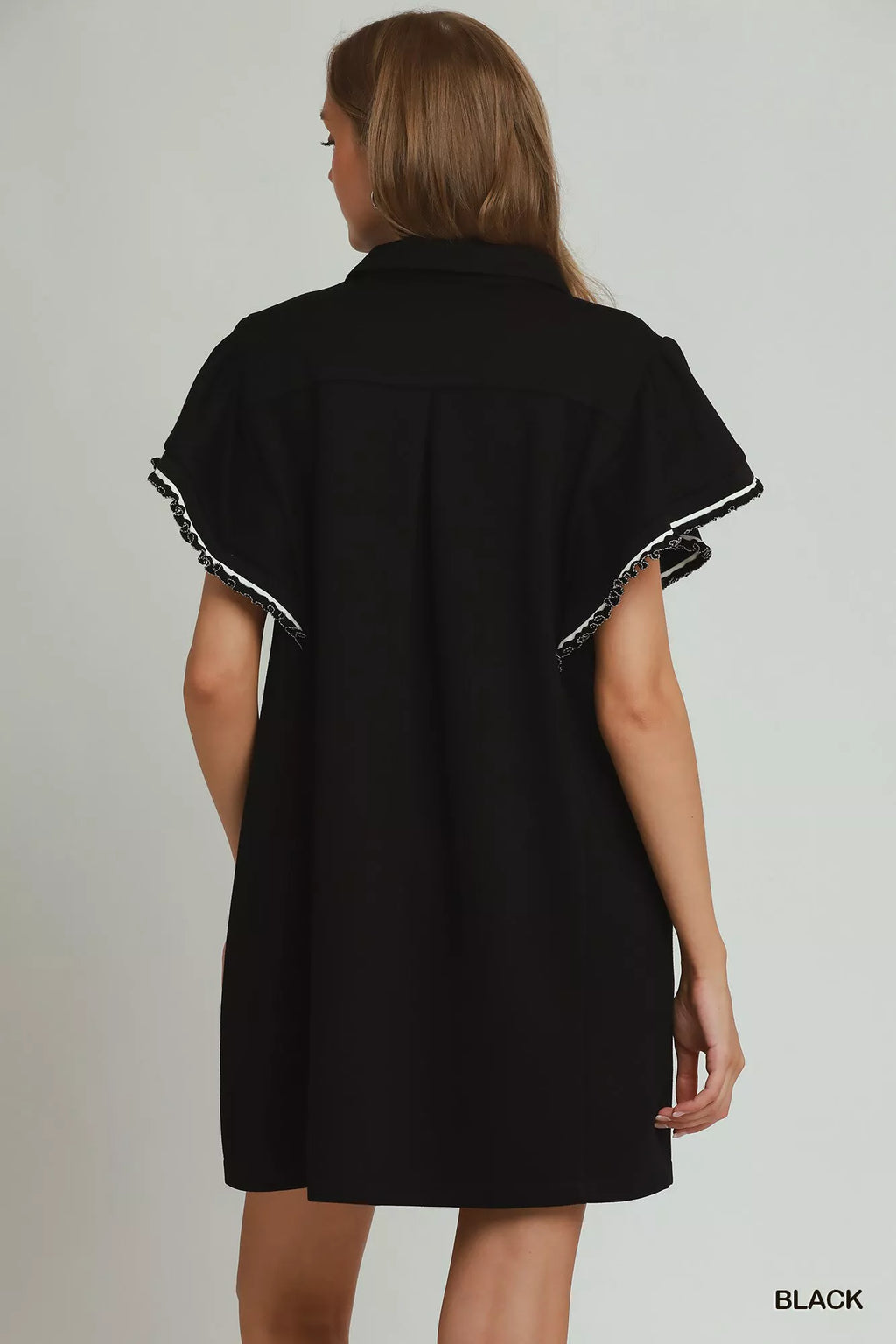 Umgee ruffle rib band butterfly sleeve mini dress with half zipper and pockets, featuring a stylish, feminine design.