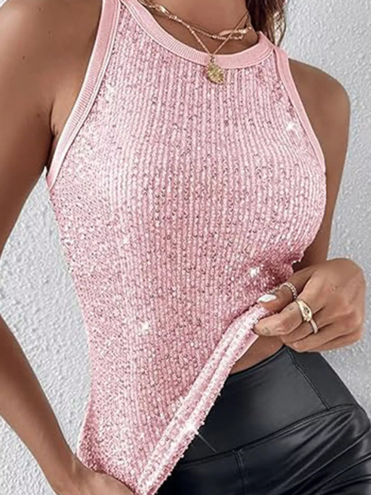 Sequin round neck tank top from Trendsi featuring shiny sequins and a classic sleeveless design, ideal for stylish casual wear.