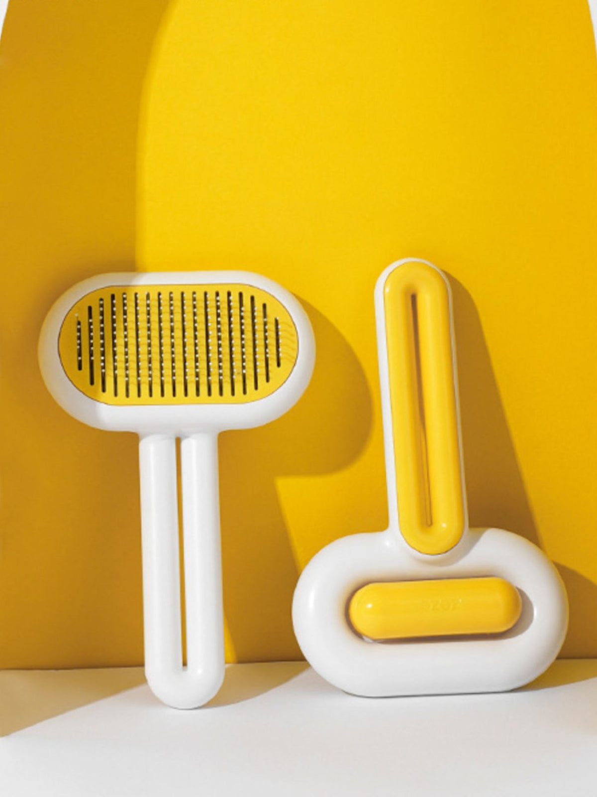 Portable pet hair remover brush by Trendsi, showing a handheld tool with a textured surface for removing pet hair from furniture.