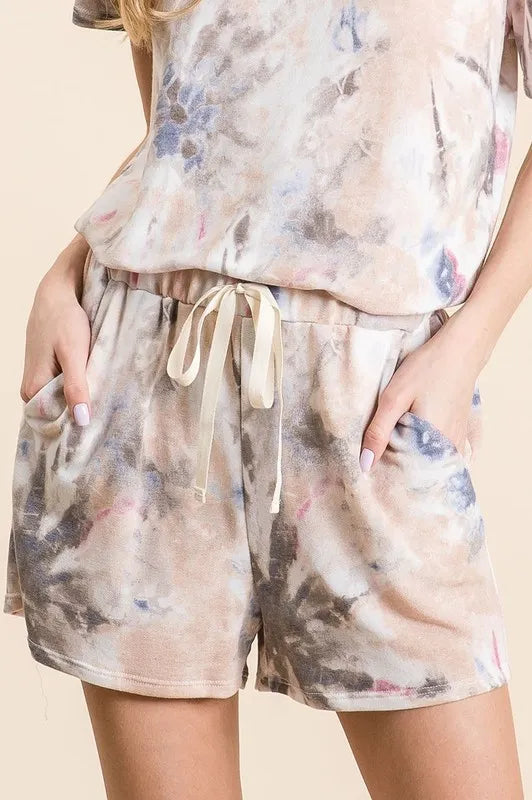 Colorful BiBi Tie Dye Terry Shorts with drawstring waist from Trendsi, showing vibrant tie dye pattern and comfortable fit.