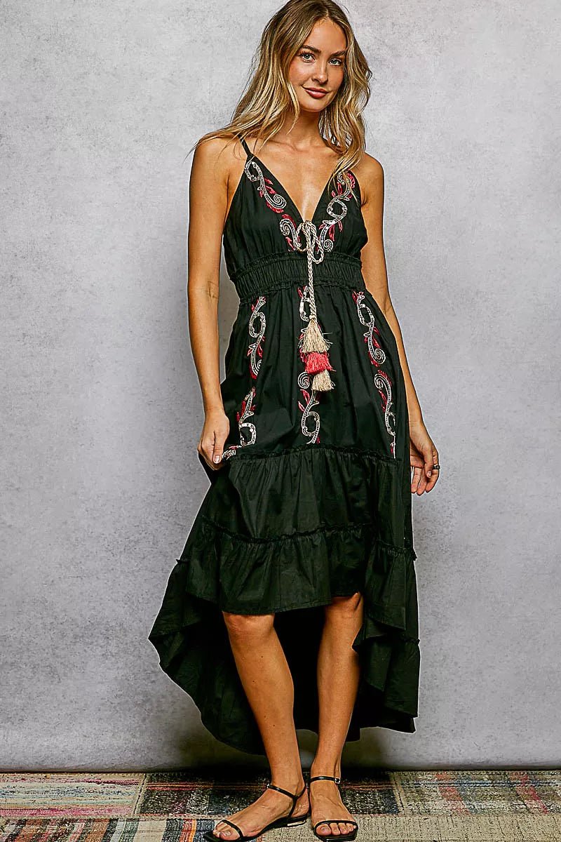 Trendsi POL embroidered detail tassel tie smocked waist midi tiered cami dress with floral embroidery and flowing fabric.
