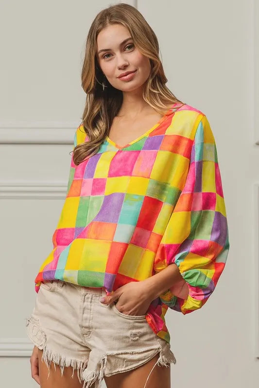 Colorful BiBi Multi Block Bubble Pop Balloon Top by Trendsi featuring vibrant bubble design and playful, textured fabric.