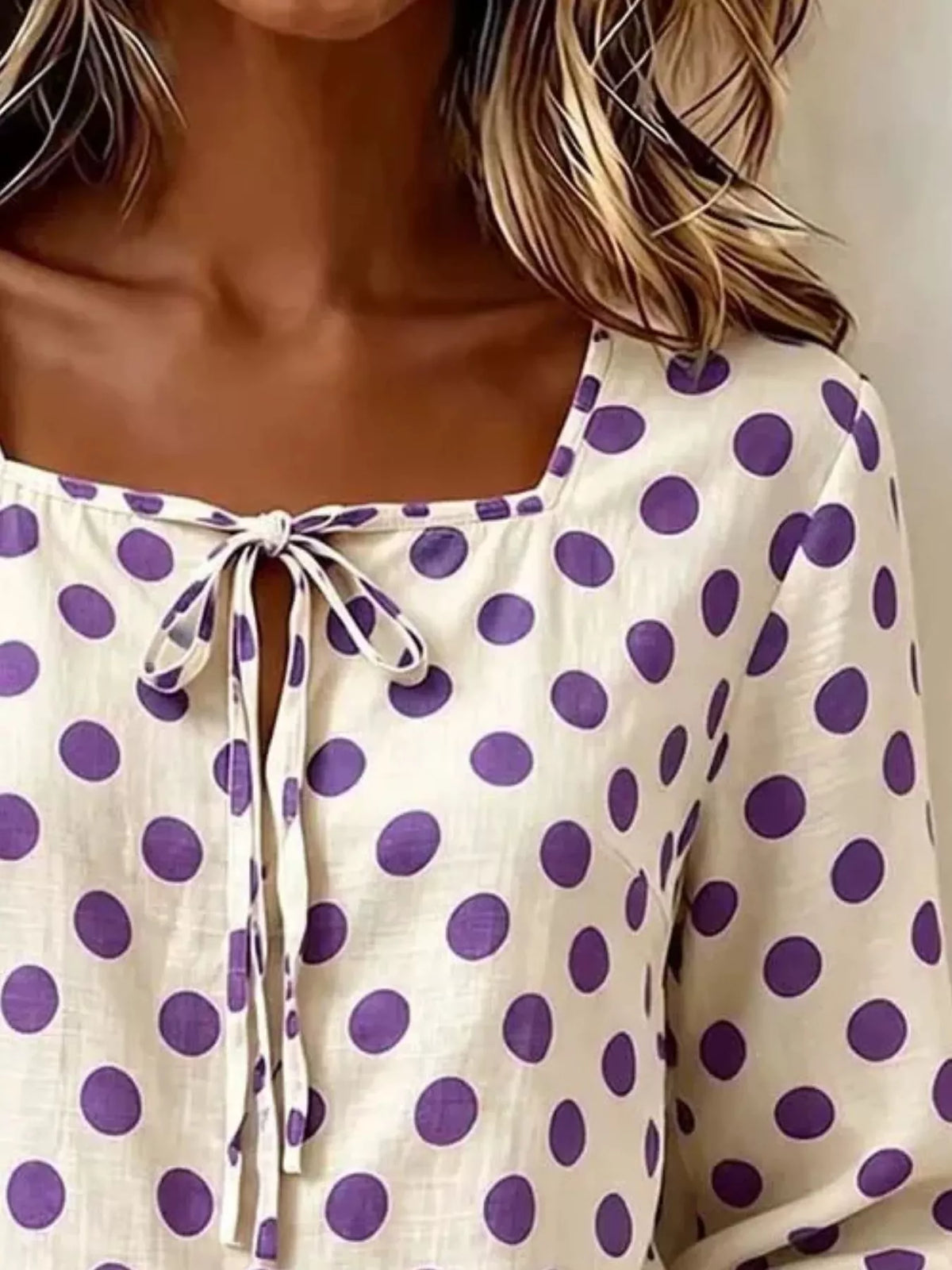Plus size square neck polka dot blouse by Trendsi, featuring a full-size fit and stylish design, shown on a model.