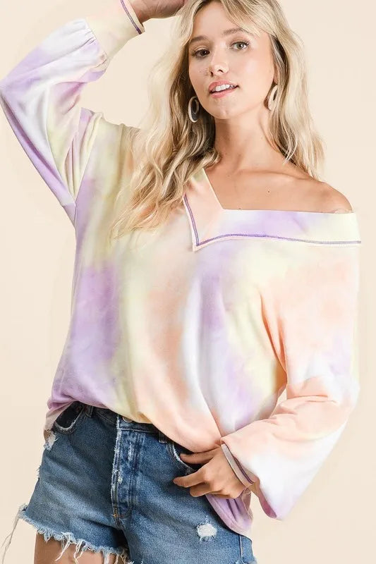 BiBi Tie Dye French Terry V-Neck Top with Puff Sleeves, casual women's blouse in vibrant tie dye fabric.
