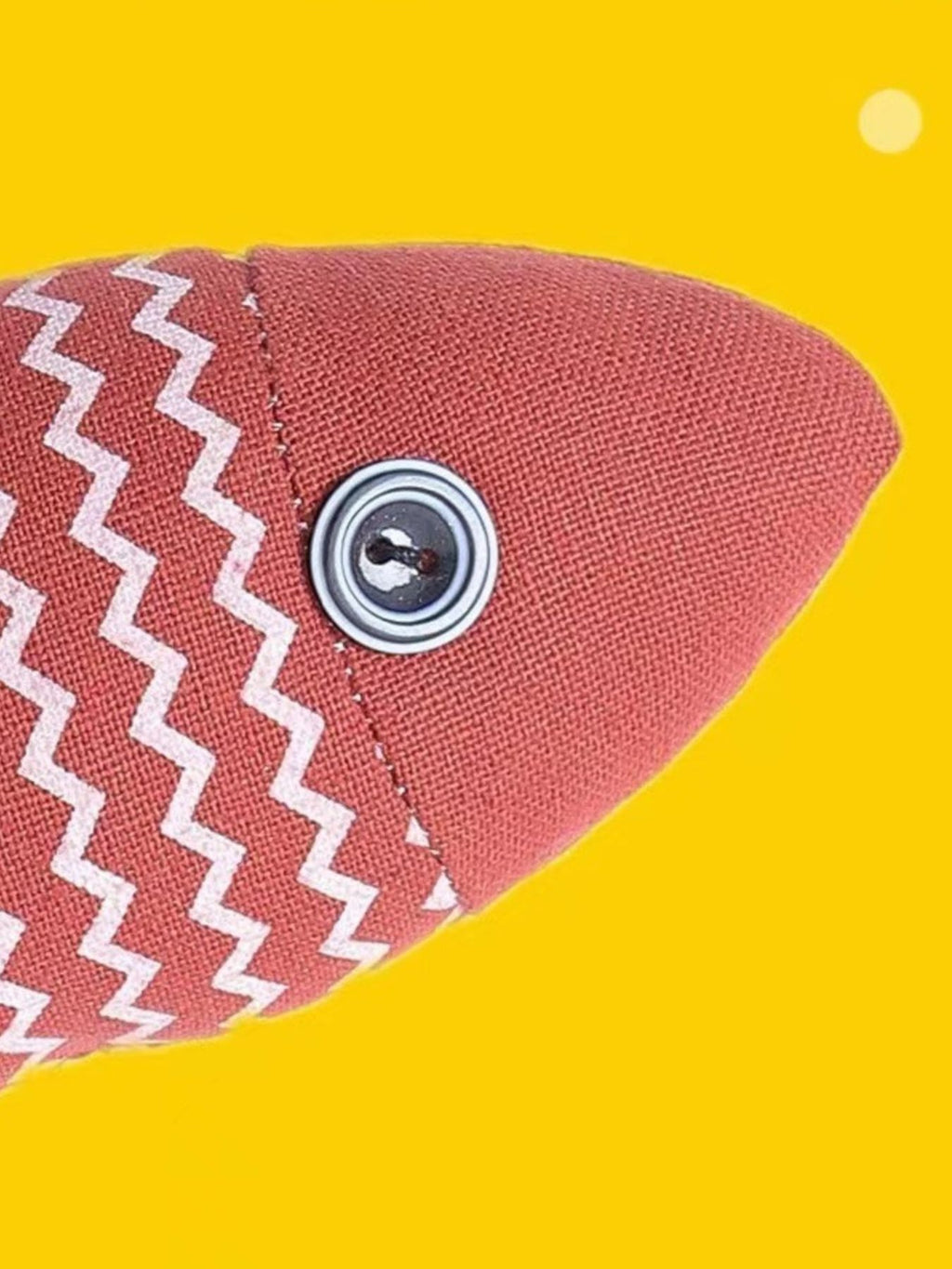 Colorful fish-shaped plush toy for pets, soft and interactive, designed for playful cats and dogs by Trendsi.
