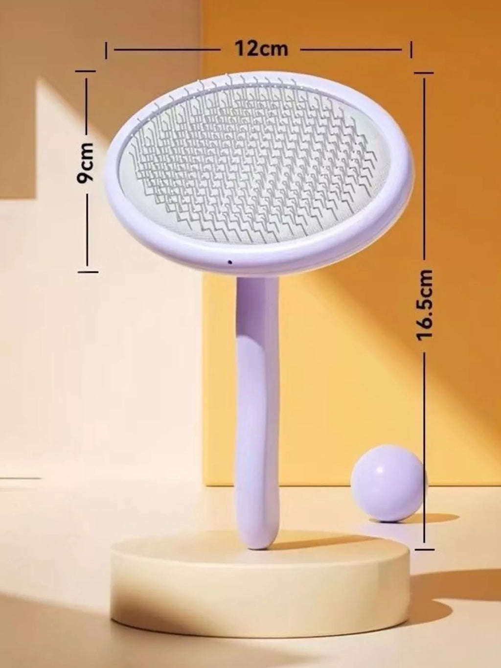 Gentle pet hair remover slicker brush by Trendsi with fine metal bristles for gentle grooming of cats and dogs.