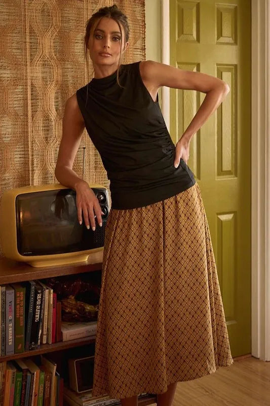 Printed midi skirt from Mittoshop by Trendsi, featuring a stylish design and flowy fabric in a full-length silhouette.