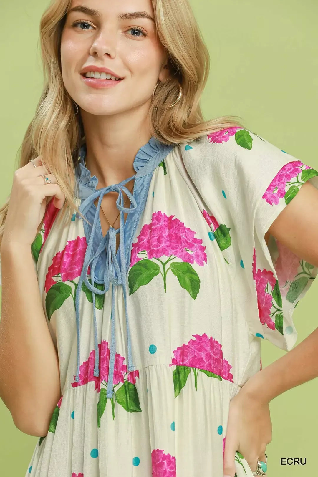 Umgee Hydrangea print tiered midi dress with flowy fabric and sleeveless design, perfect for spring and summer fashion.