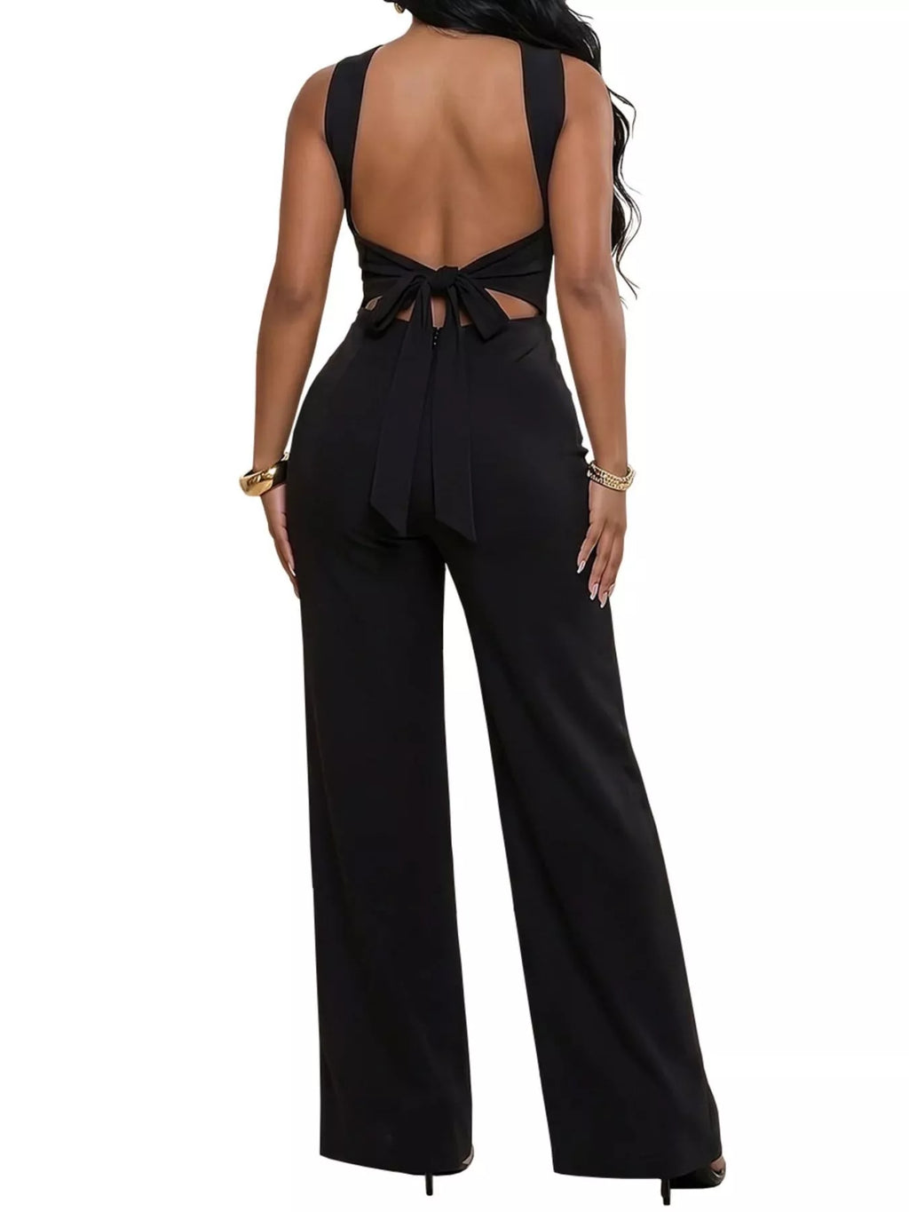 Backless twist top and wide-leg pants set by Trendsi, featuring a stylish backless design and relaxed fit for casual wear.