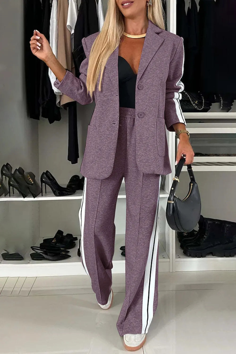 Full size contrast lapel collar top and pants set by Trendsi, featuring stylish design and comfortable fit, shown on a model.