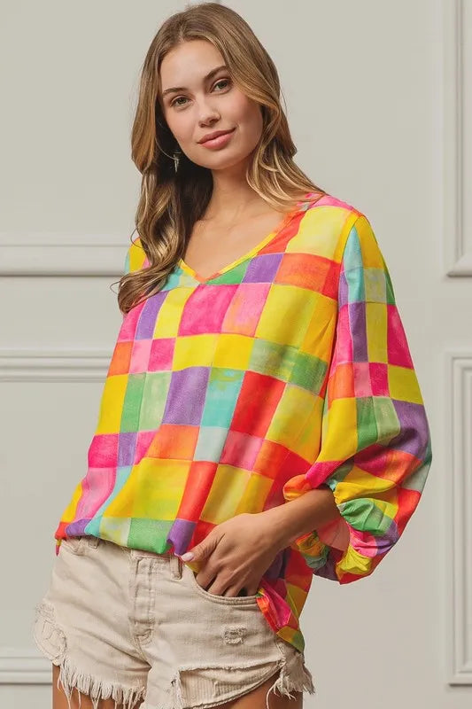 Colorful BiBi Multi Block Bubble Pop Balloon top by Trendsi, featuring vibrant blocks and playful bubble design.