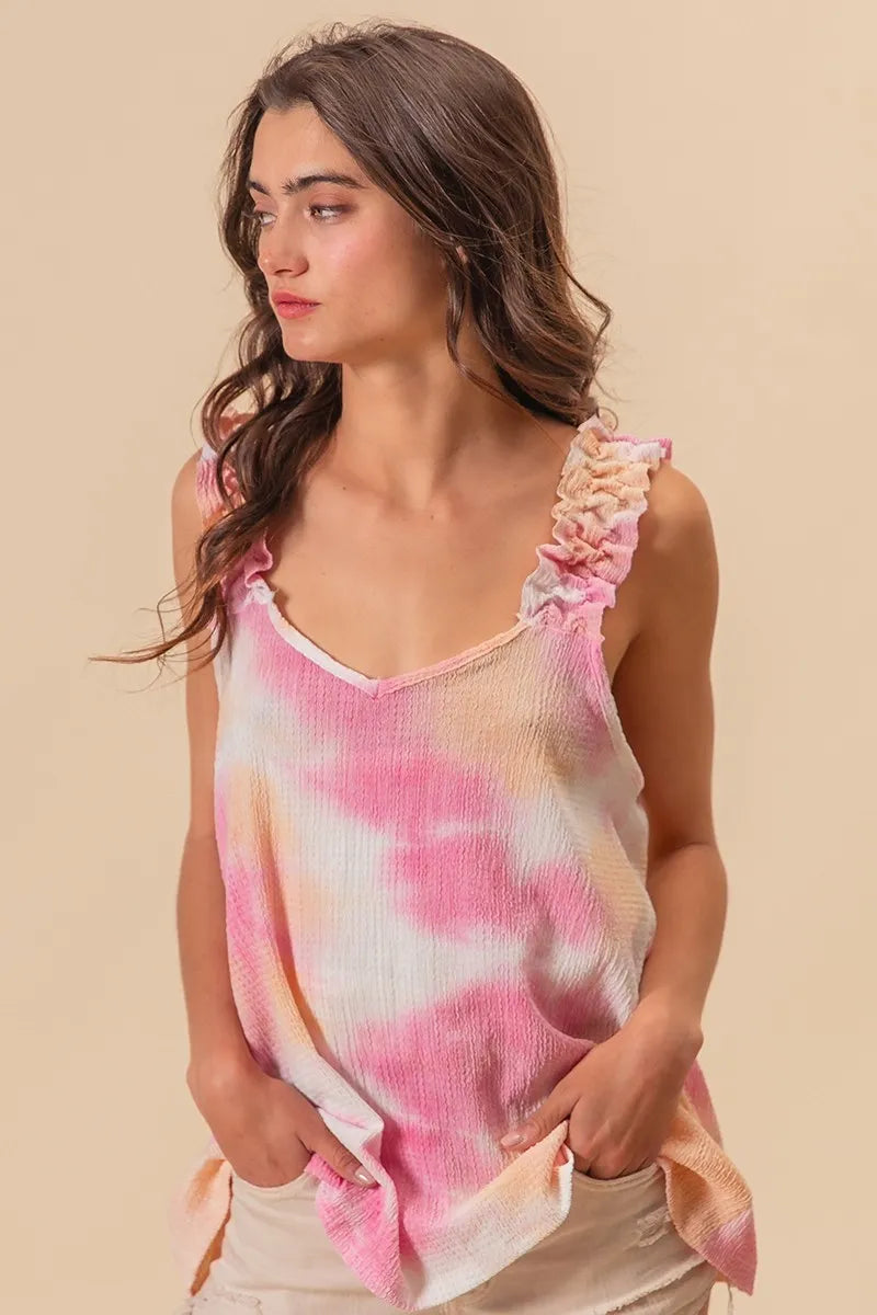 Colorful BiBi tie-dye printed textured woven fabric with ruffled details, showcasing vibrant patterns and intricate craftsmanship.