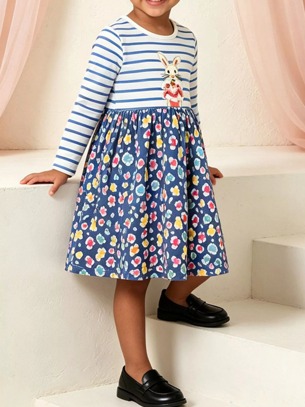 Children's bunny graphic striped floral print dress by Trendsi, featuring colorful floral patterns and playful bunny design.