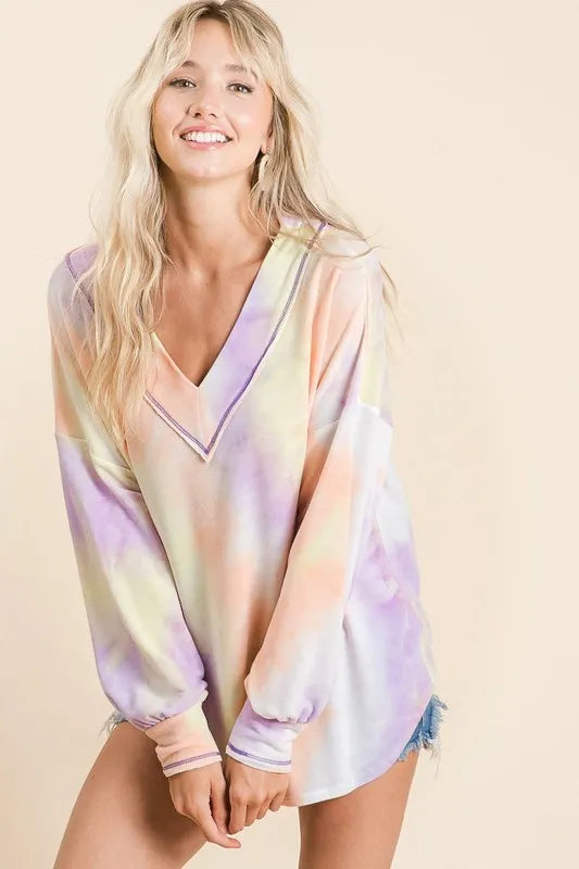 BiBi Tie Dye French Terry V-Neck Top with puff sleeves, casual women's fashion by Trendsi, featuring vibrant tie-dye and soft fabric.