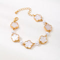 Gold-plated alloy flower bracelet with delicate floral design, perfect for elegant jewelry styling