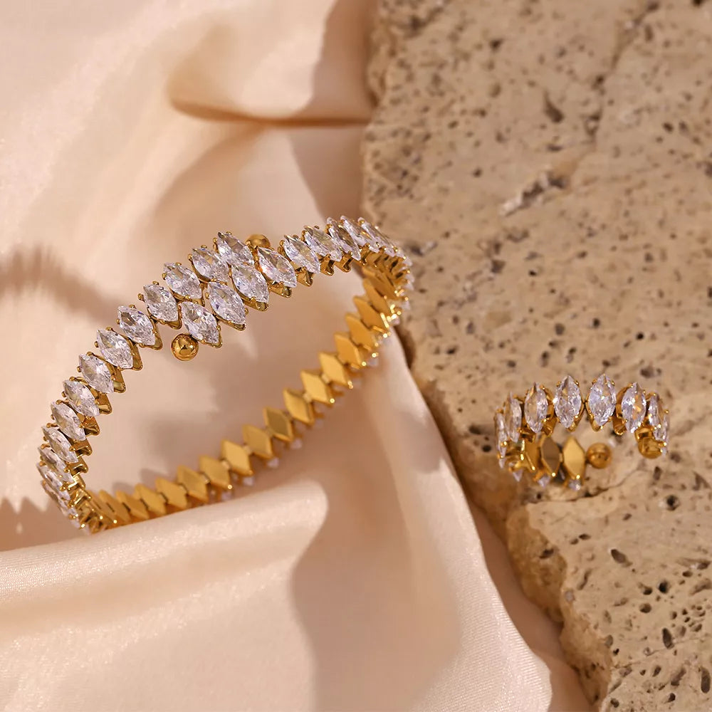 18K gold-plated zircon bracelet and ring jewelry set featuring sparkling stones and elegant design from Trendsi.