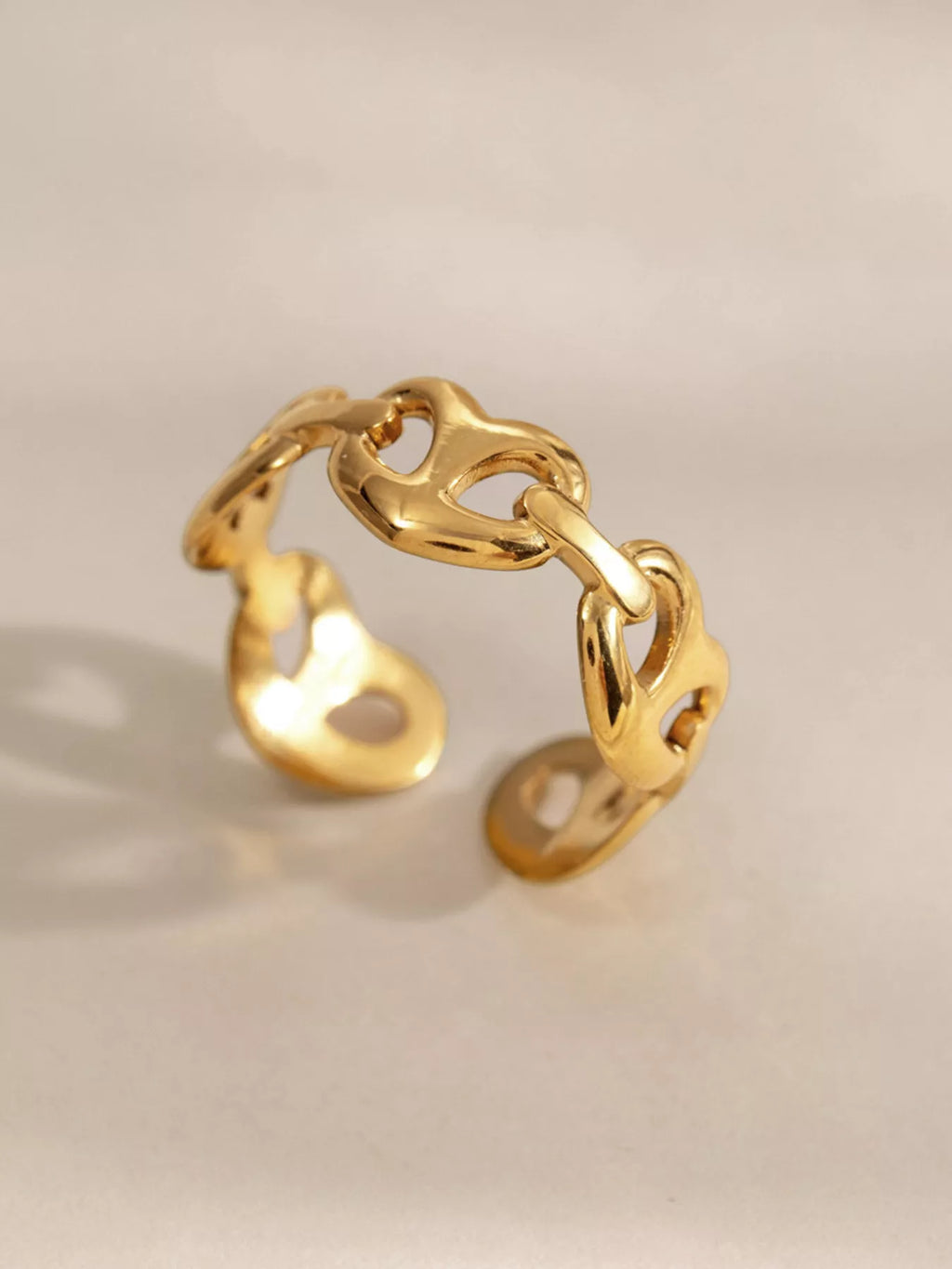 18K gold-plated open ring with sleek band design, stylish jewelry piece from Trendsi.