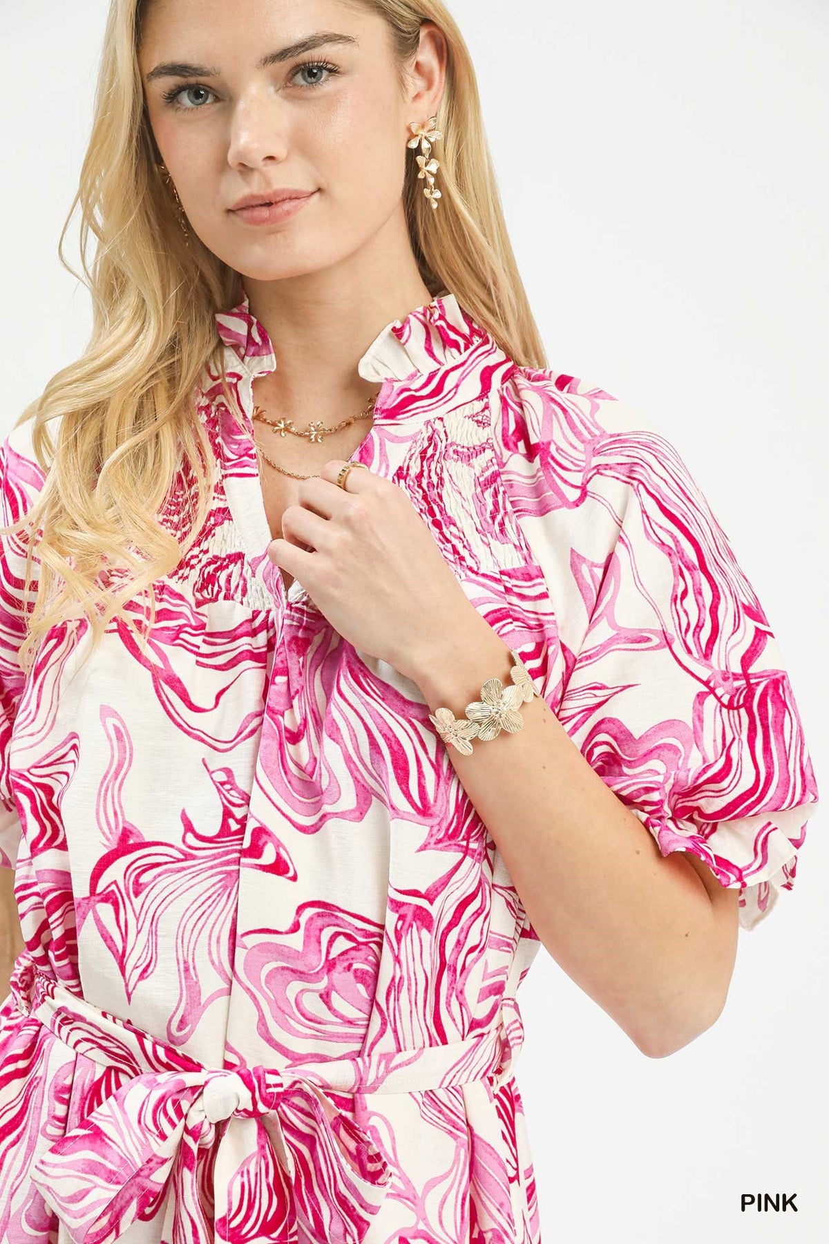 Umgee abstract print smocked tie waist midi dress with flowing fabric and stylish design, perfect for casual or dressy occasions.