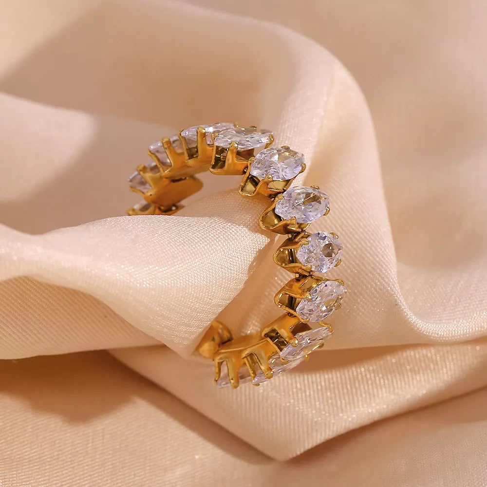 18K gold-plated zircon bracelet and ring jewelry set with sparkling stones, featuring elegant design and trendy style.