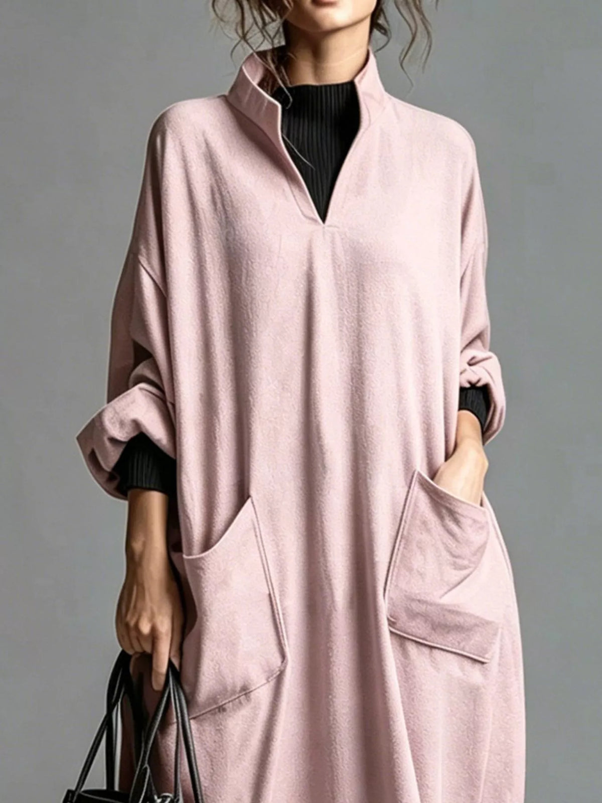 Plus size full-size loose-fit mock neck midi dress with pockets by Trendsi, shown in a stylish, comfortable design.