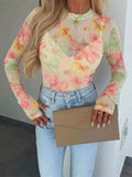 Plus size floral print sheer mesh long sleeve T-shirt from Trendsi, featuring a full-size floral pattern and lightweight, breathable fabric.