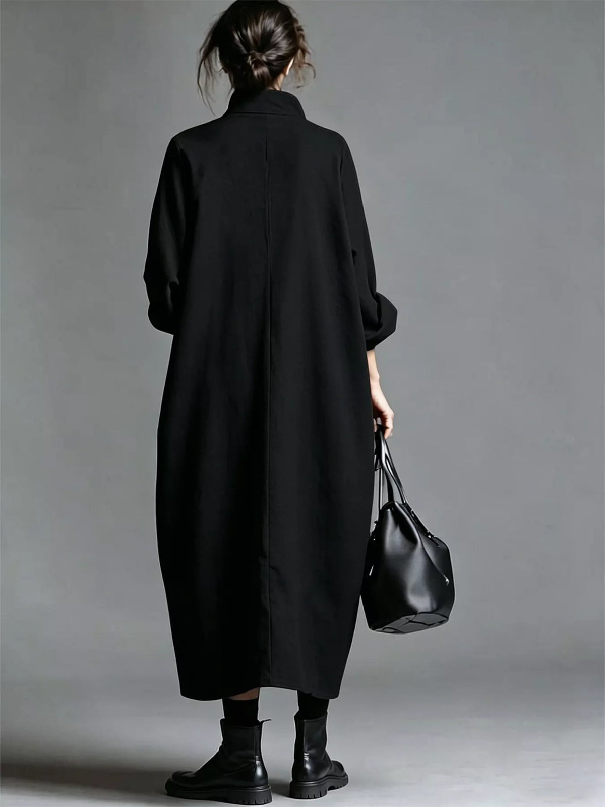 Plus size loose-fit mock neck midi dress with pockets by Trendsi, featuring a full size, casual and comfortable design.