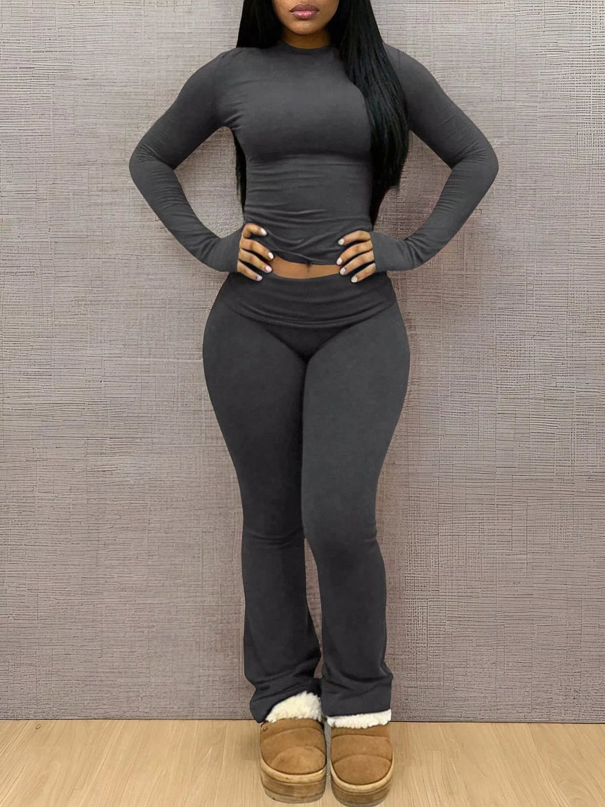 Slim-fit long sleeve crop top and leggings lounge set by Trendsi, featuring a comfortable, stylish matching activewear ensemble.