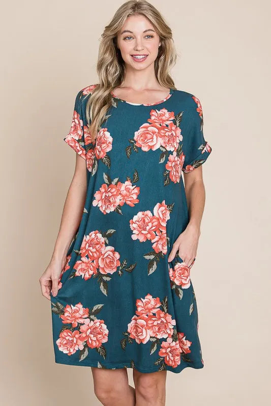 Trendsi BOMBOM floral round neck short tee dress with pockets, lightweight fabric, and colorful floral pattern.