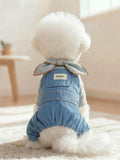Denim pet jumpsuit with bowknot detail from Trendsi, featuring a stylish and comfortable outfit for small dogs or cats.