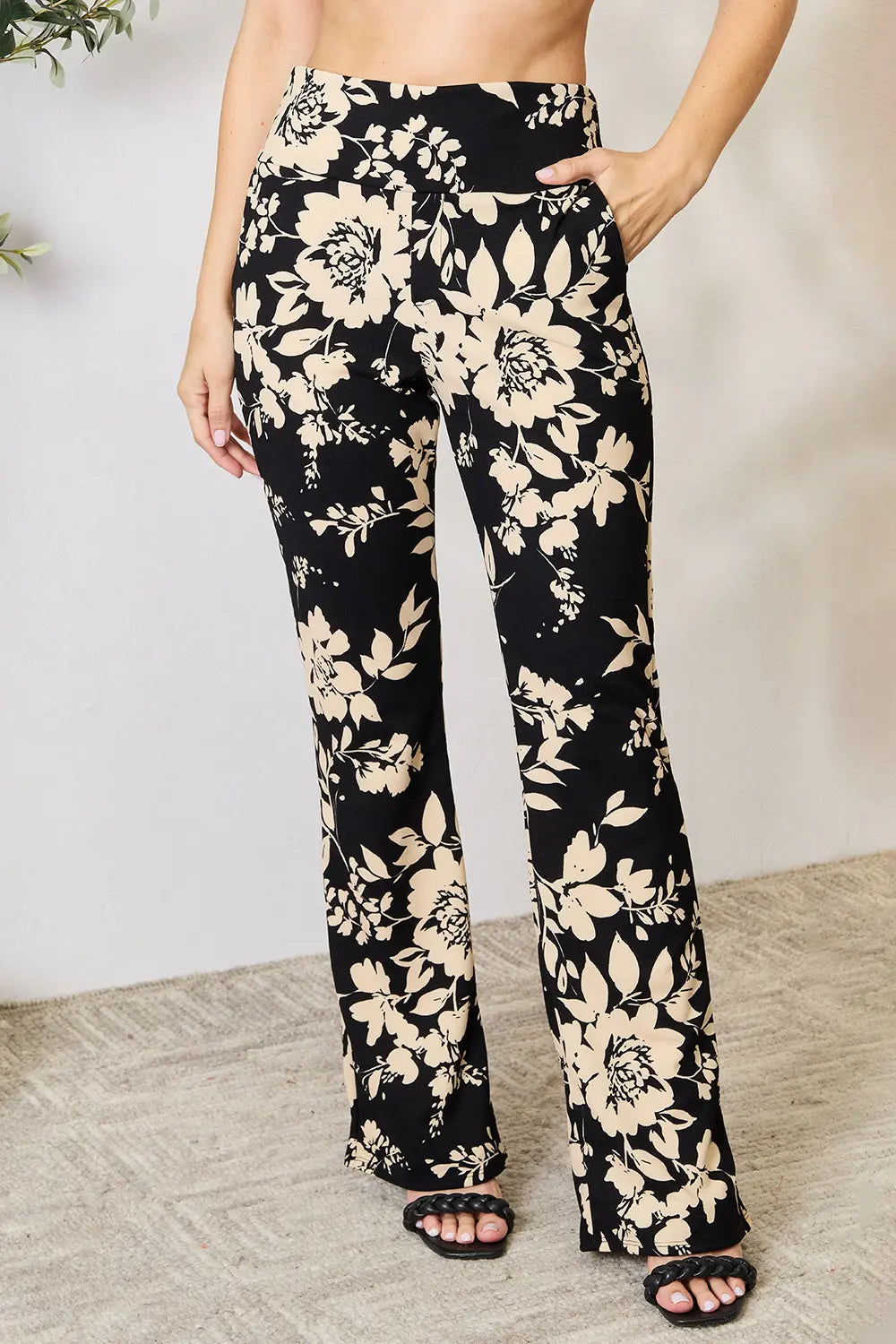 Heimish plus size high waist floral flare pants with wide legs, stylish and comfortable for a trendy plus size look.