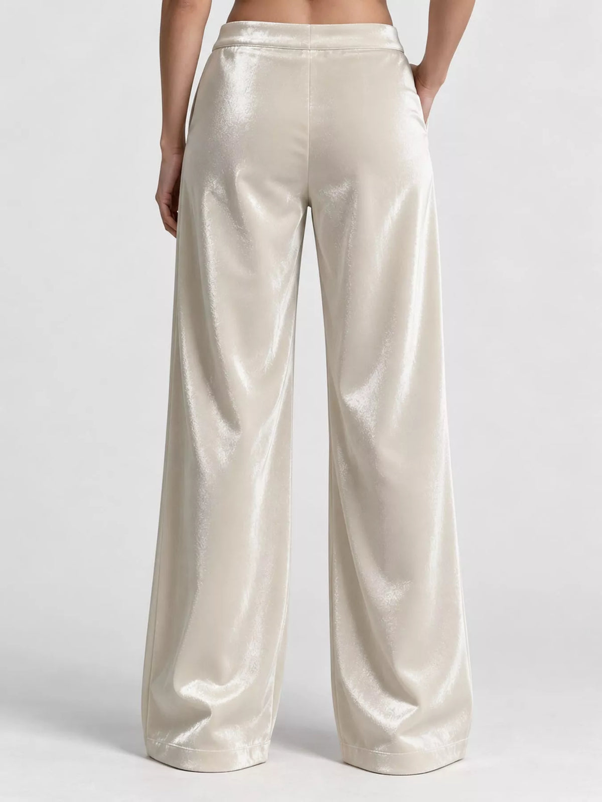 Plus size high-waisted velvet pants with wide legs and pockets, stylish trendy fashion from Trendsi.