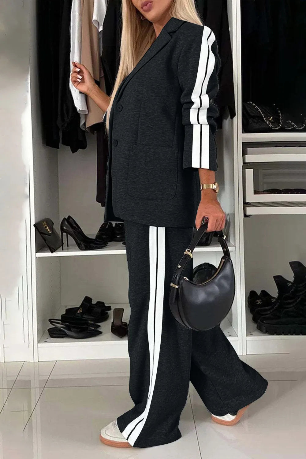 Full size contrast lapel collar top and pants set by Trendsi featuring a stylish coordinated outfit with lapel collar details.