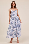 Floral woven V-neck dress with back ribbon tie from Trendsi, featuring a stylish design and feminine floral pattern.