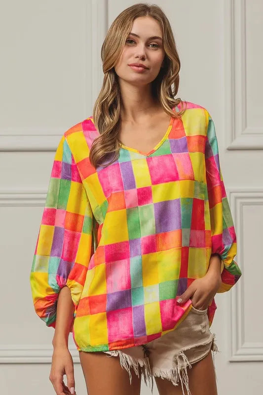 Colorful BiBi Multi Block Bubble Pop Balloon top by Trendsi with vibrant bubble designs and playful style.