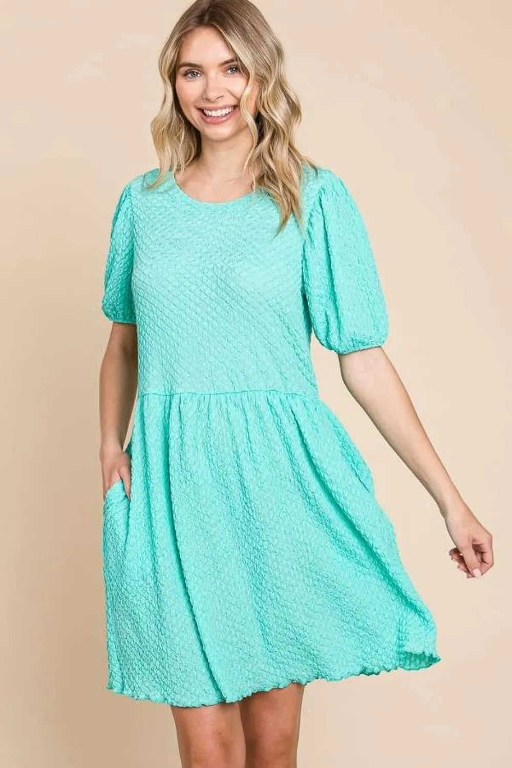 Culture Code textured round neck puff sleeve dress by Trendsi, showcasing a full-size, stylish dress with textured fabric and puff sleeves.