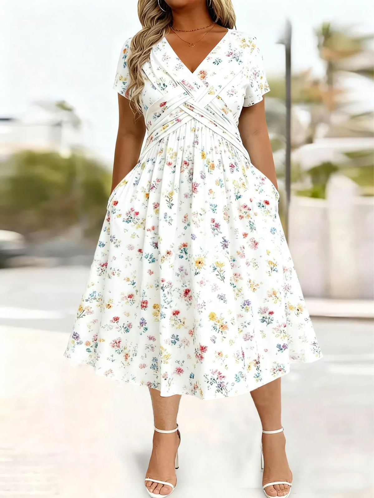 Plus size twisted front short sleeve midi dress with pockets by Trendsi, featuring a full-length design and stylish silhouette.