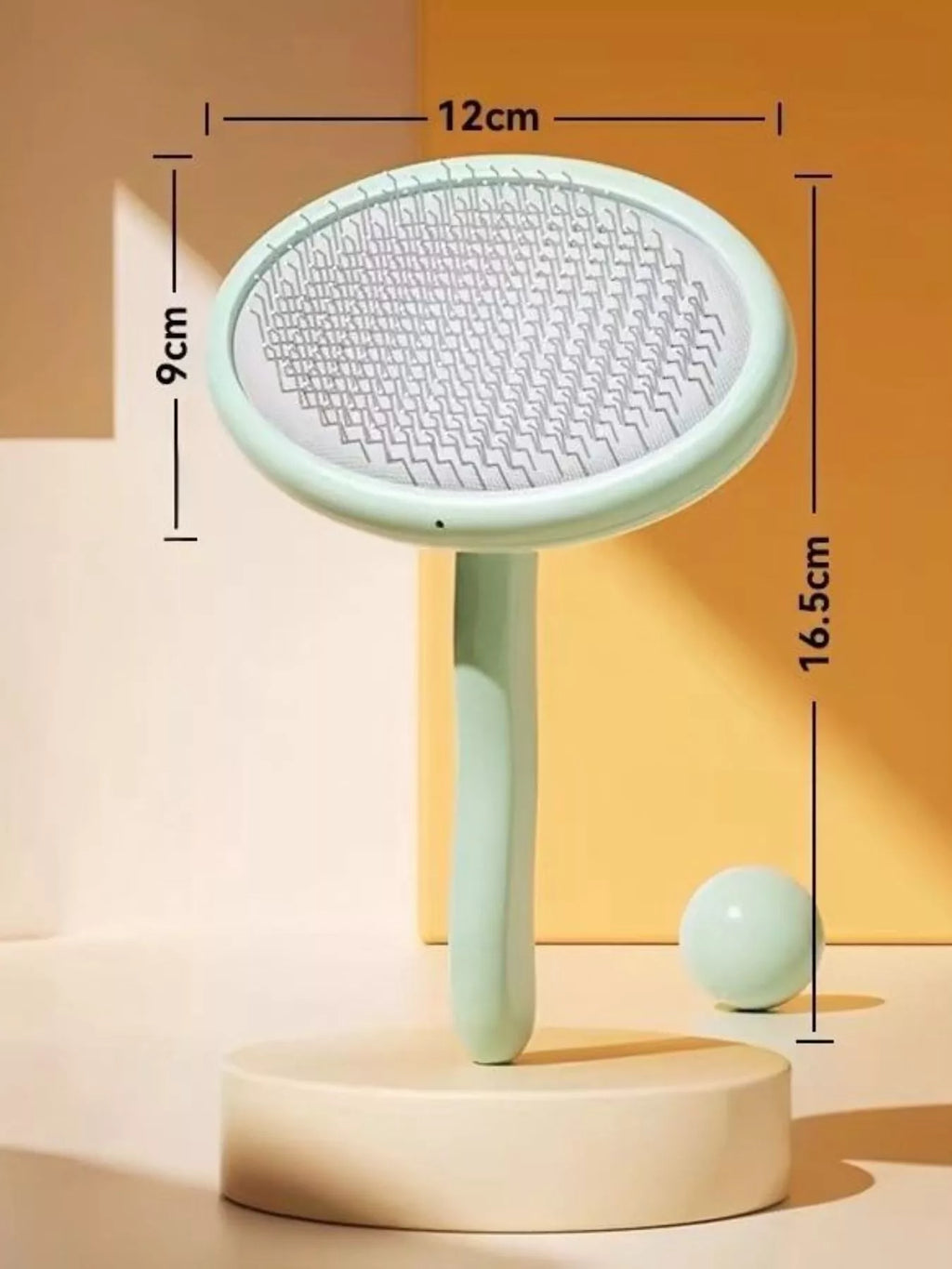 Gentle pet hair remover slicker brush from Trendsi with fine metal pins for gentle grooming of cats and dogs.