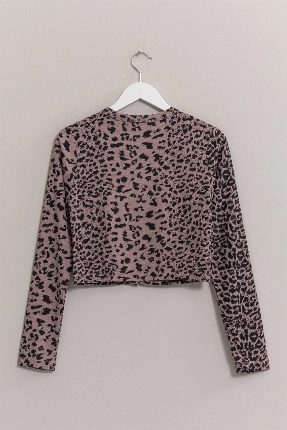 Trendsi HYFVE animal print snap-down crop cardigan with long sleeves and button closure, featuring a stylish animal pattern.