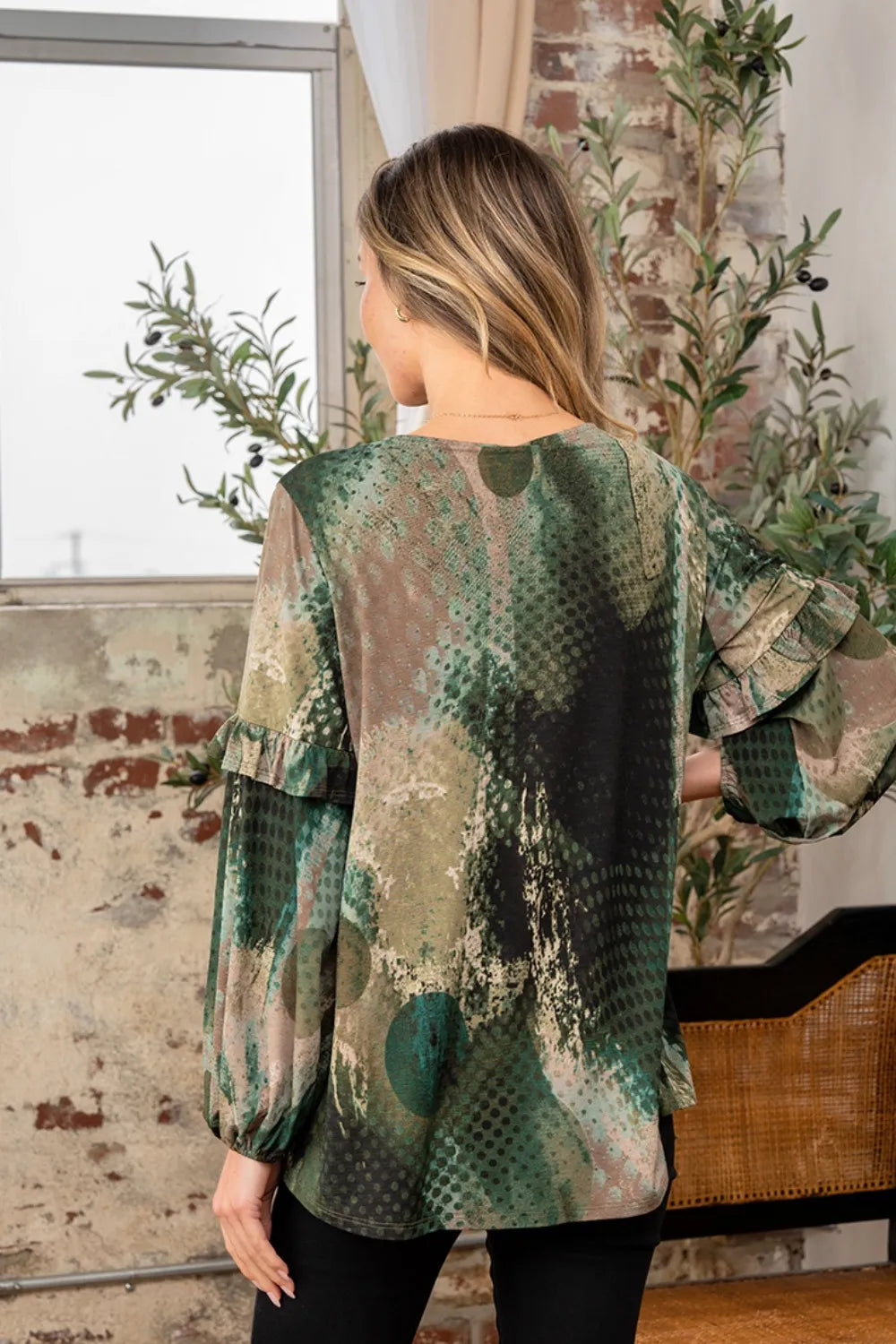 Sew In Love snakeskin print long sleeve top with ruffle detail, trendy fashion piece by Trendsi, shown in full size.