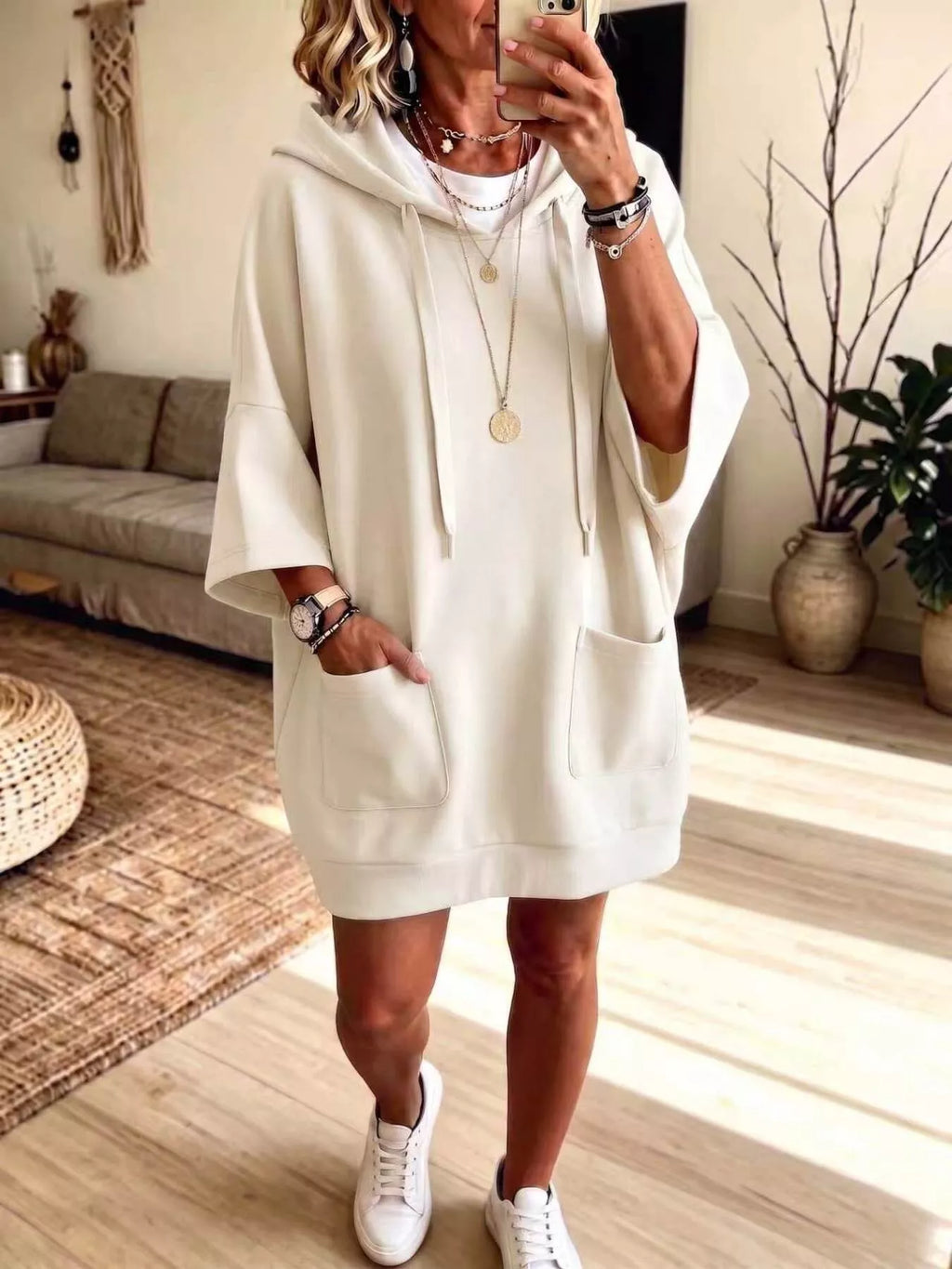 Full size oversized hoodie with drawstring, front pockets, and plus size fit by Trendsi, shown in black with a relaxed fit.