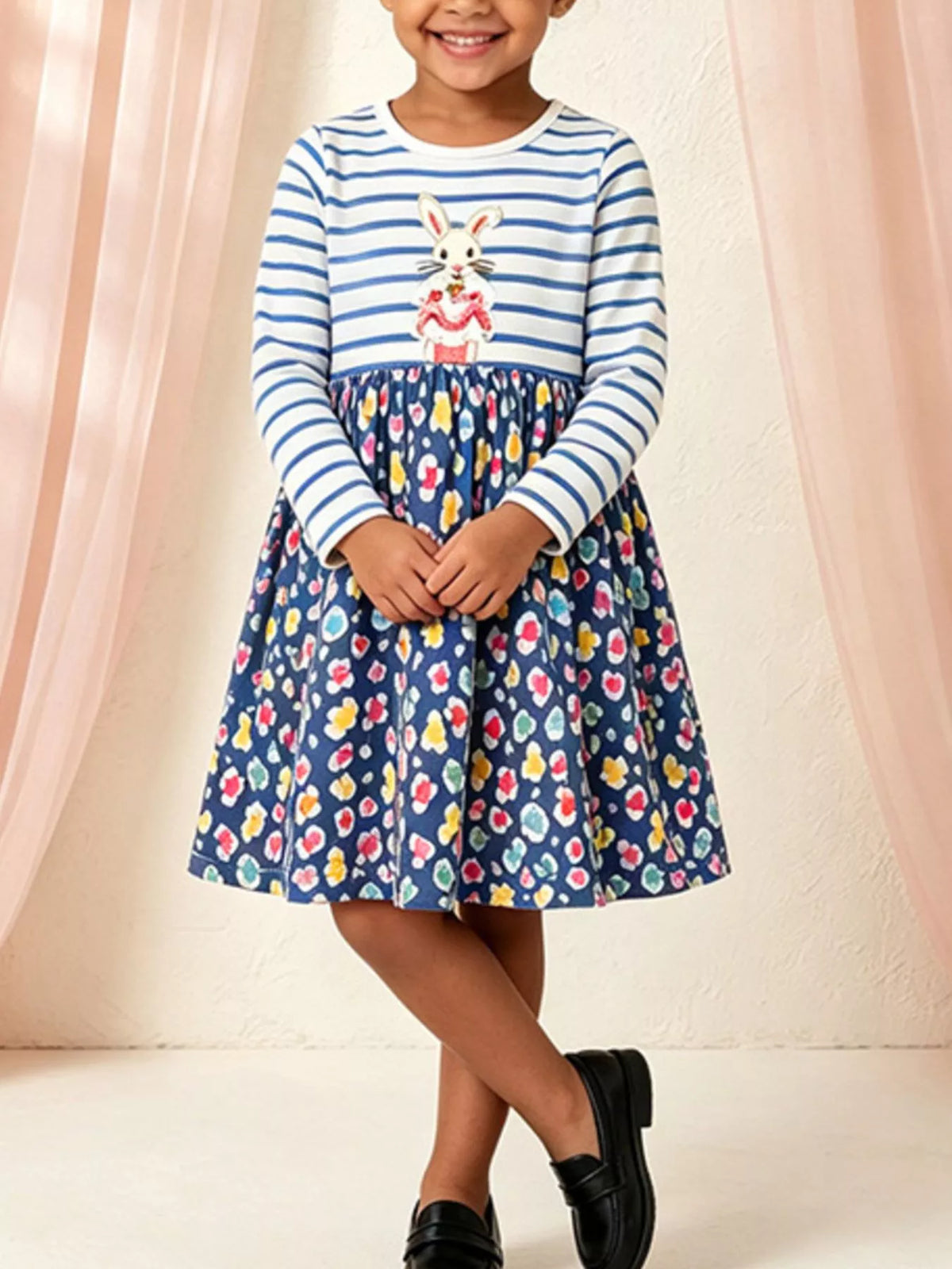 Children's bunny graphic striped floral print dress by Trendsi, featuring colorful floral patterns and striped design for kids.