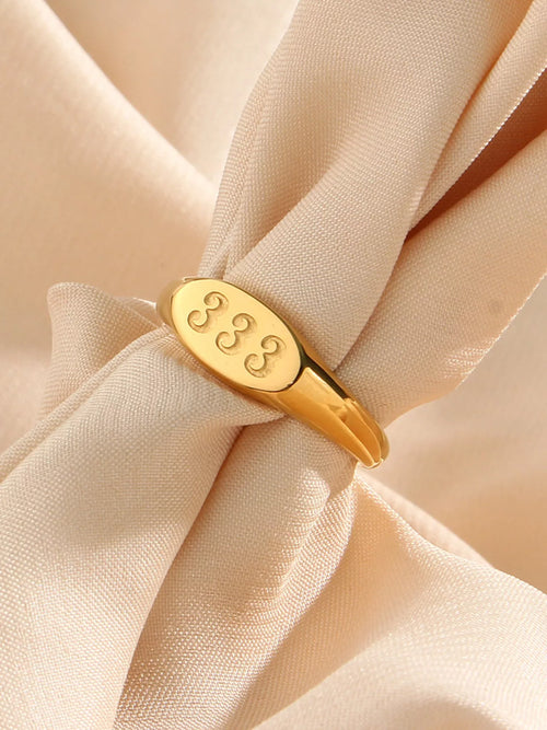 18K gold-plated 333 number signet ring with engraved design, showcasing a stylish and elegant jewelry piece.