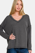 Black Zenana Texture Exposed Seam V-Neck Long Sleeve T-Shirt with subtle textured fabric and exposed seam details.